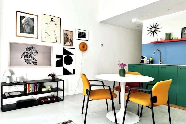 Main living area with dining table and kitchenette