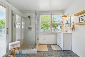Shower, hair dryer, towels, soap