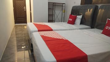 Chambre Deluxe avec lits jumeaux | 1 chambre, chambres insonorisées, Wi-Fi gratuit, draps fournis