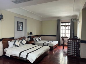 Family Room, City View | Desk, blackout drapes, free WiFi, bed sheets - Orient Hotel Da Nang (Da Nang)