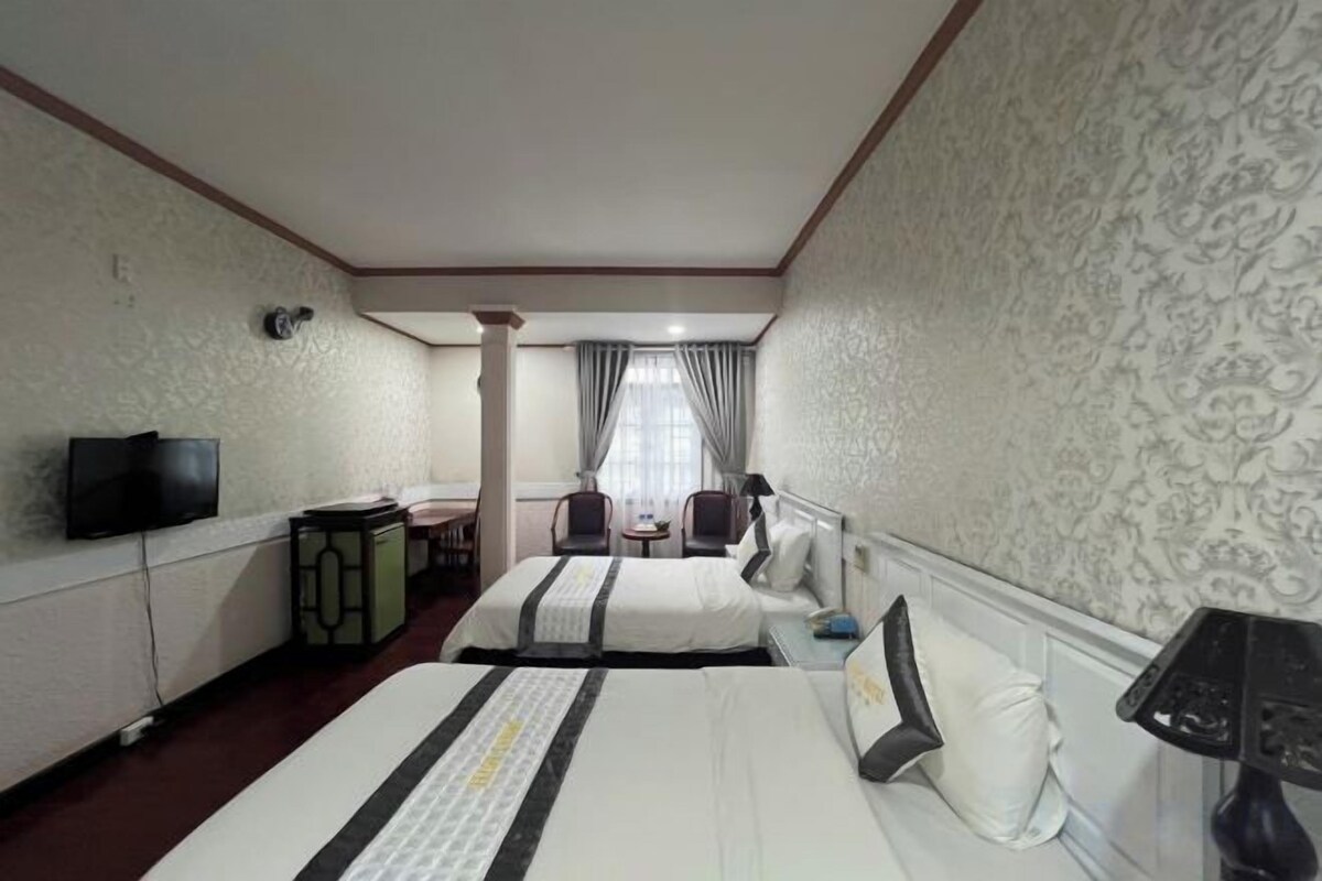 Desk, blackout curtains, free WiFi, bed sheets