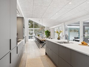 Fridge, microwave, dishwasher, cookware/dishes/utensils