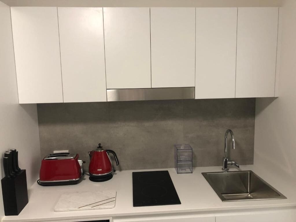 Fridge, microwave, toaster, cookware/dishes/utensils