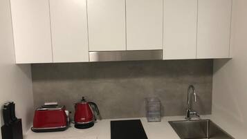 Fridge, microwave, toaster, cookware/dishes/utensils