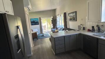 Deluxe House, Kitchen, Garden Area | Private kitchen | Full-size fridge, microwave, oven, stovetop