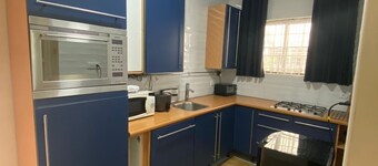 Cozy 2-bedroom apartment in charming Paramaribo with AC, WiFi