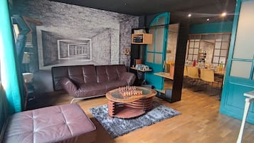 TV, fireplace, books