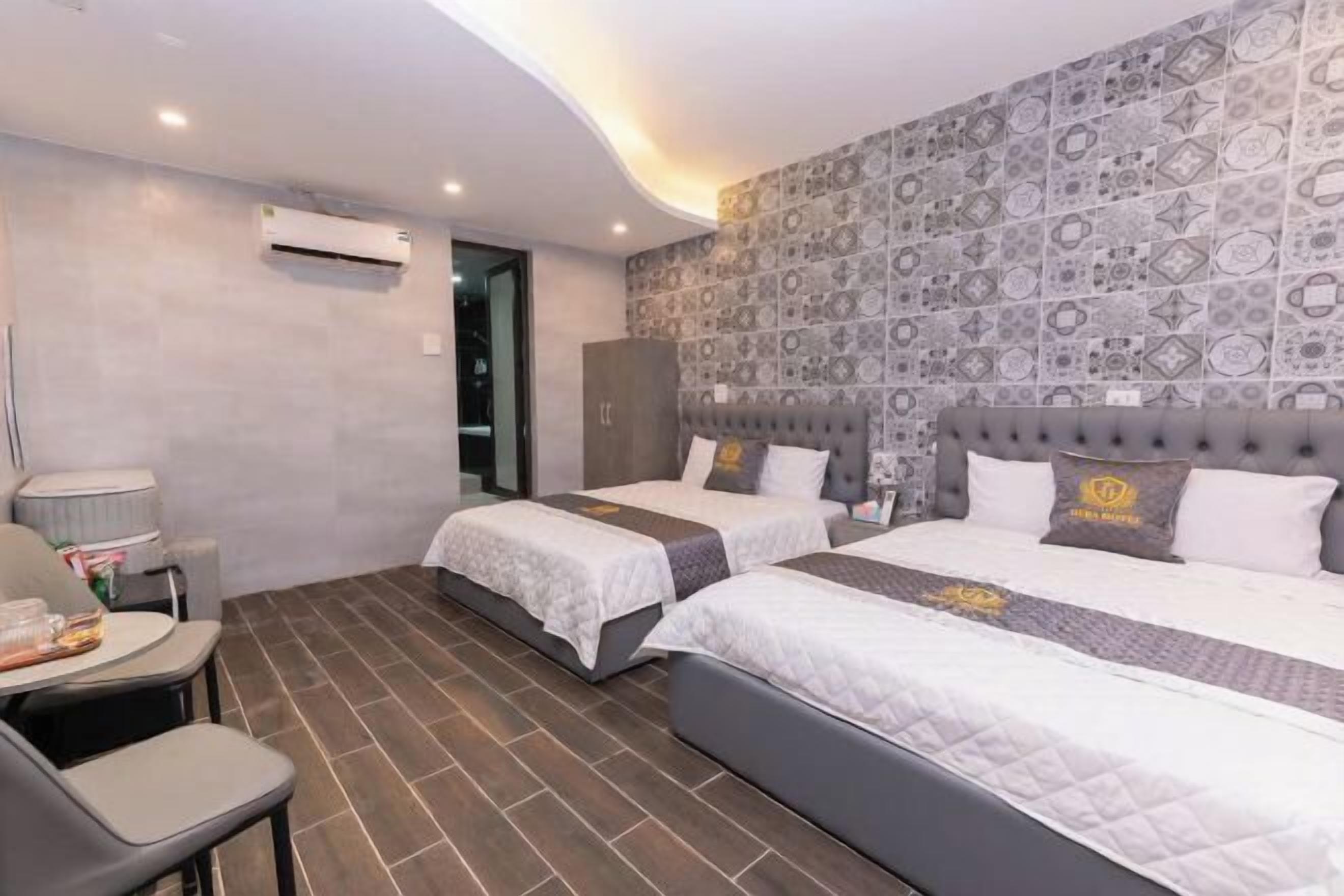 Premium bedding, memory foam beds, free minibar items, desk