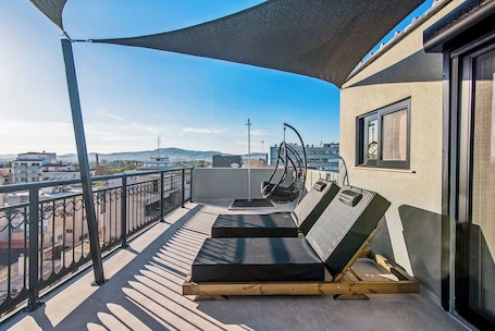 Suite estudio | Terraza o patio. Mc Queen Boutique Apartments