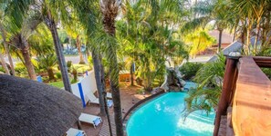 2 outdoor pools, pool umbrellas, pool loungers