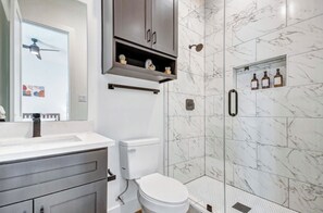 Shower, hair dryer, bidet, towels