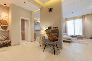 Luxury Apartment A1 - Bohemian | Living area | TV - Amber Hospitality Izdihar (Riyadh)