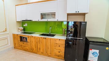Family Apartment, 2 Bedrooms, Kitchen | Private kitchen | Fridge, microwave, stovetop, rice cooker
