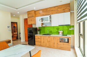 Deluxe Apartment, 1 Bedroom, Kitchen | Private kitchen | Fridge, microwave, stovetop, rice cooker