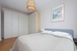 Apartment, 1 Bedroom, Balcony | 1 bedroom, bed sheets - Bright Apartment for 3 People by Renters (Warsaw)