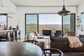 TV, offices - Revolve House By The Cohost Company (Yucca Valley)