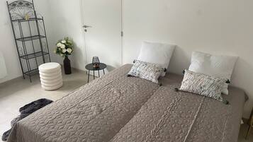 4 slaapkamers, een strijkplank/strijkijzer, wifi, beddengoed