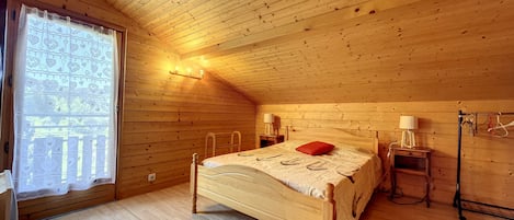 2 habitaciones y tabla de planchar con plancha