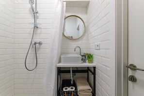 Hair dryer, towels, soap, toilet paper