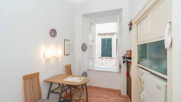 Apartment (One-Bedroom Apartment) | Private kitchen | Fridge