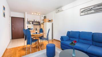 Apartment (Apartment Blue Lagoon (ST) - One Bedr) | Living room | 32-inch flat-screen TV with cable channels