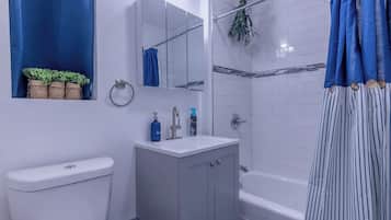 Hair dryer, towels, soap, shampoo