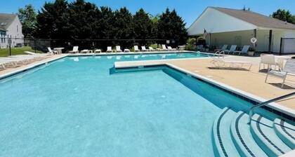 Townhome with a community pool and sleeps up to 8 people!