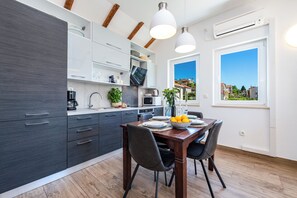 Apartment (Comfort One Bedroom Apartment with Ba) | Private kitchen | Fridge - Apartments Terra (Dubrovnik)