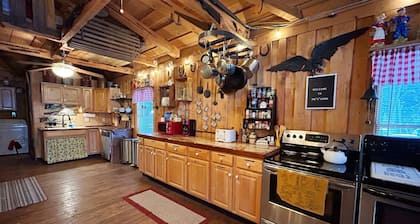 Rustic cabin w/ 29 acres. Enjoy a hot tub, wood stove, nature trails and more.