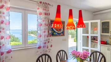 House (Two Bedroom Holiday Home with Terrace) | Dining room