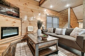 Smart TV, fireplace, table football, books