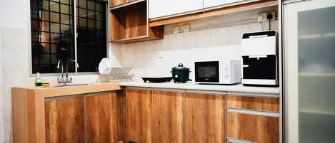 Fridge, microwave, cookware/dishes/utensils