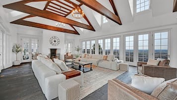 Smart TV, fireplace, books, printers