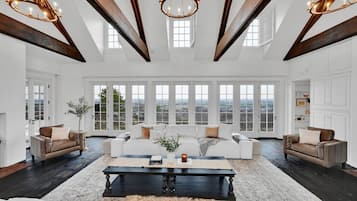 Smart TV, fireplace, books, printers