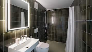 Shower, hair dryer, heated floors, towels