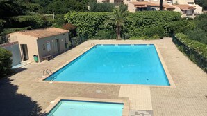A rectangular swimming pool with a tiled deck surrounding it. - 2 ROOM APARTMENT, SEMAPHORE, SAINTE MAXIME (Sainte-Maxime)