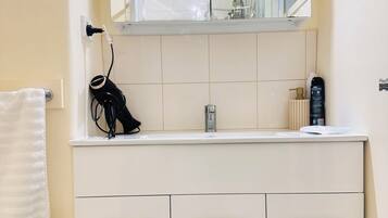 Hair dryer, bidet, towels, soap