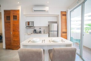 Fridge, microwave, stovetop, coffee/tea maker