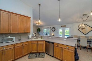 Fridge, microwave, oven, stovetop - This house is a 5 bedroom(s), 3 bathrooms, located in Port Charlotte, FL. (Port Charlotte)