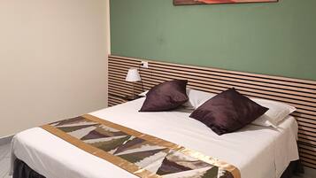 1 chambre, fer et planche Ă  repasser, Wi-Fi, draps fournis