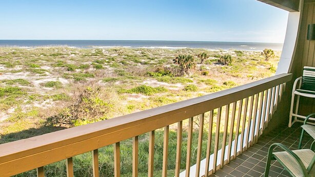 A balcony with a view of a beach and ocean. - Oceanfront Oasis Epic Views St Aug Free Tix (St. Augustine)
