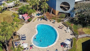 A resort with a large pool, palm trees, and a view of the ocean. - Oceanfront Oasis Epic Views St Aug Free Tix (St. Augustine)