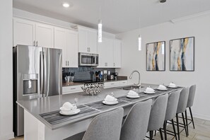 Fridge, microwave, oven, stovetop - Luxury 4BR Champions Gate Home w/ Private Pool, BBQ, and Water Park Access! (Davenport)