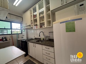 Fridge, microwave, oven, cookware/dishes/utensils