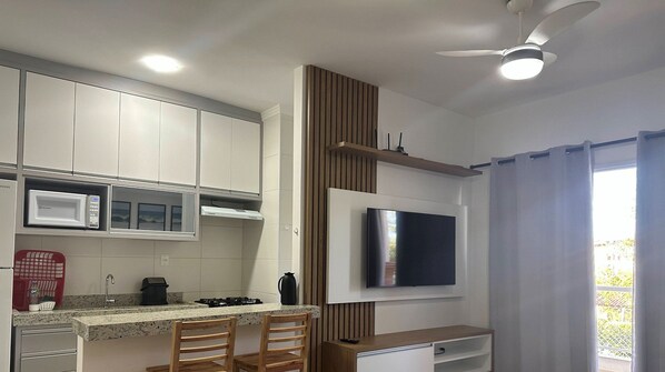 Fridge, microwave, oven, cookware/dishes/utensils