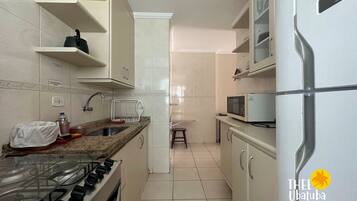 Fridge, microwave, oven, cookware/dishes/utensils