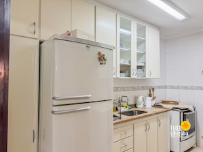 Fridge, microwave, oven, cookware/dishes/utensils
