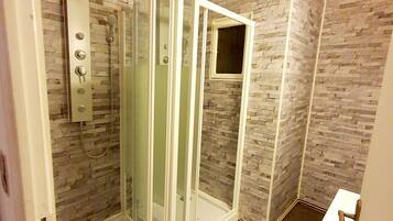 Shower, free toiletries, hair dryer, towels