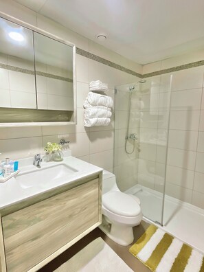 Shower, towels, soap, shampoo