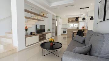 Superior Duplex | Living area | 50-inch Smart TV with digital channels, Netflix, heated floors